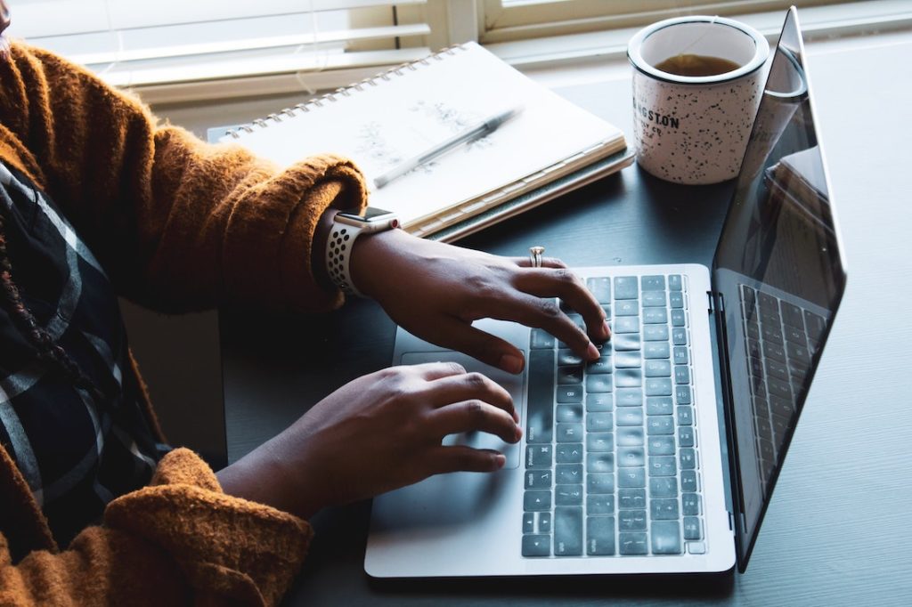 Writing Rituals of the Most Successful Writers in Hollywood_person typing on laptop